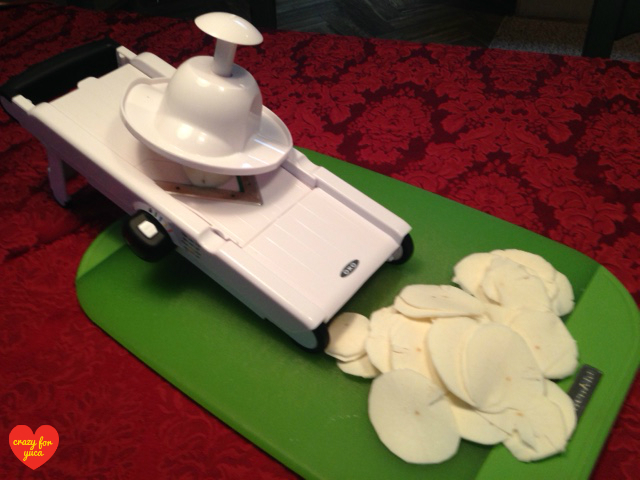 Oxo Good Grips V-Blade Mandoline Slicer used to slice yuca (cassava) into yuca chips.