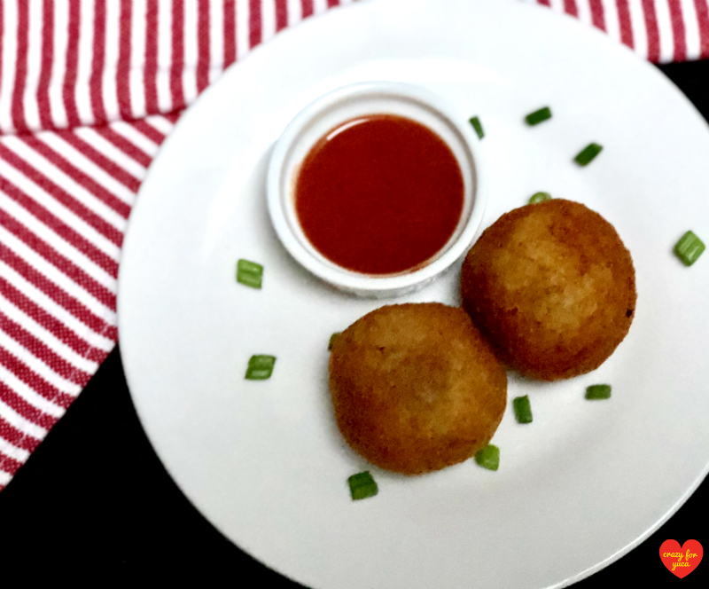 2 Stuffed Cassava Balls plated