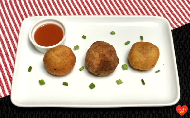 3 Stuffed Cassava Balls with hot sauce
