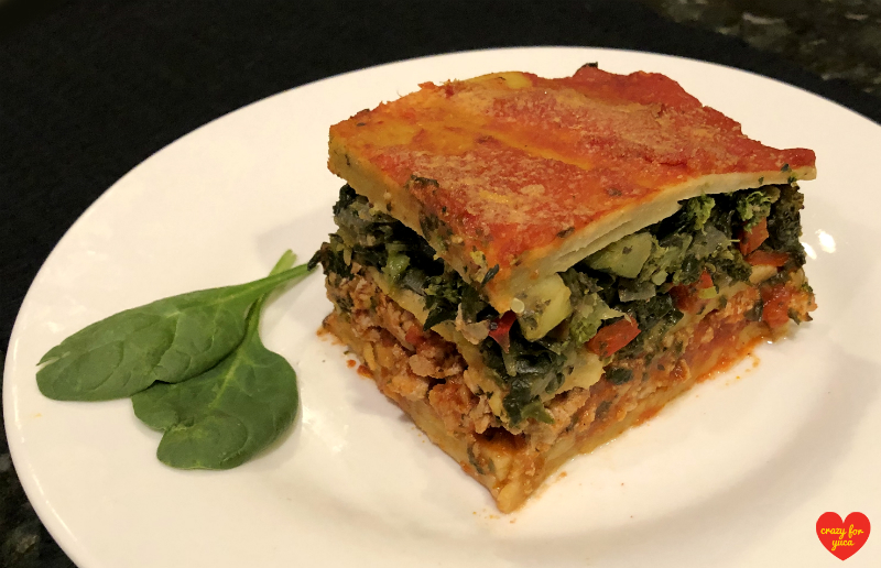 CrazyForYuca.com - a gluten and dairy-free recipe blog featuring all things yuca / cassava. One piece on Cassava Flour Pasta Lasagna on a white plate.